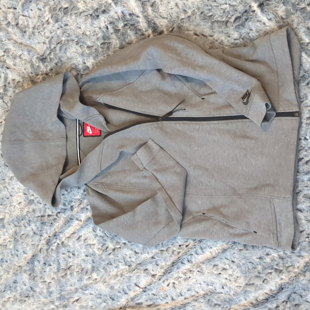 Women's grey Nike tech jacket size medium